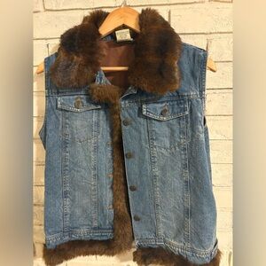 ST. JOHNS BAY Denim vest with brown faux fur collar and placket and hem trim.